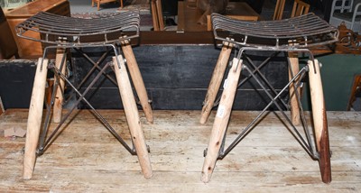 Lot 1274 - A pair of industrial stools with turned timber...