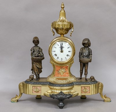 Lot 200 - A modern gilt metal figural mantel clock, with...