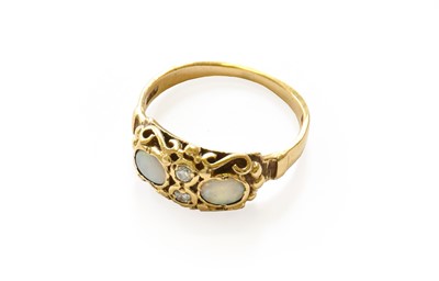 Lot 115 - An 9 carat gold opal and diamond ring, finger...