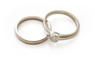 Lot 107 - An 18 carat white gold diamond solitaire ring,...