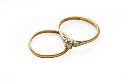 Lot 124 - An 18 carat gold diamond solitaire ring,...
