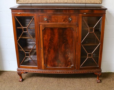 Lot 1368 - A mahogany bow-fronted side cabinet, raised on...