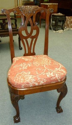 Lot 1233 - A Set of Four George II Walnut Dining Chairs, Mid 18th century, with acanthus carved top rails,...