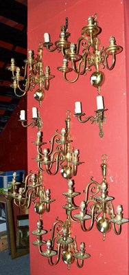 Lot 571 - A set of six brass five-branch wall sconces and a set of three two-branch wall sconces