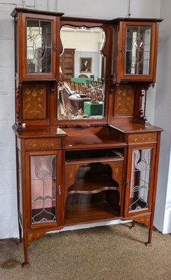 Lot 1282 - An Art Nouveau inlaid mahogany mirrored...