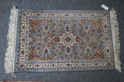 Lot 1021 - Indian Carpet, salmon pink field of leafy...