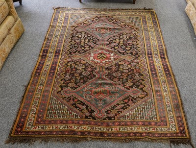 Lot 1225 - Khamseh rug, the charcoal field with three...