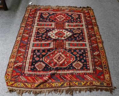 Lot 1227 - Kuba rug, compartmentalised field with three...