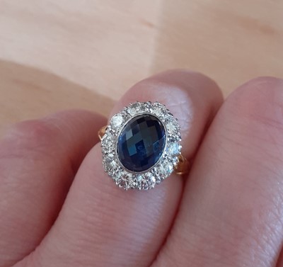 Lot 2025 - An 18 Carat Gold Sapphire and Diamond Cluster...