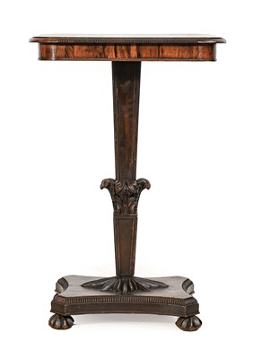 Lot 1325 - A Regency Rosewood Lamp table, with turned...