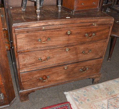 Lot 1154 - A George III mahogany three height chest of...