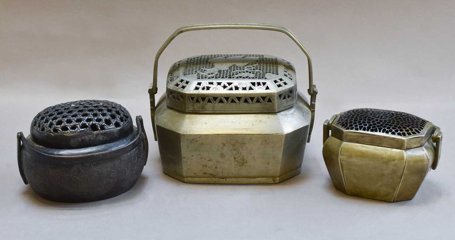 Lot 20 - A Japanese Meiji period hand warmer and two...