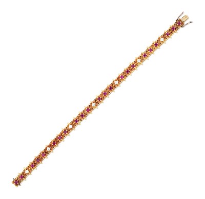 Lot 2285 - An 18 Carat Gold Ruby and Diamond Bracelet