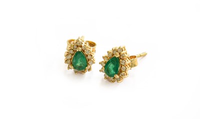 Lot 180 - A pair of 14 carat gold emerald and diamond...