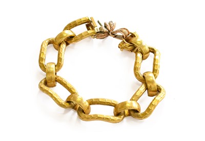 Lot 167 - An oblong textured link bracelet, stamped...