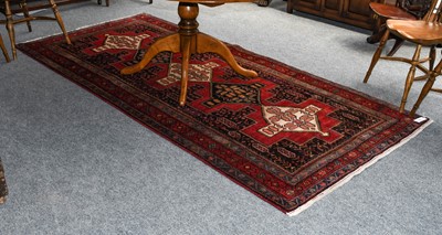 Lot 1200 - Nahavand Rug, the stepped linked medallion...