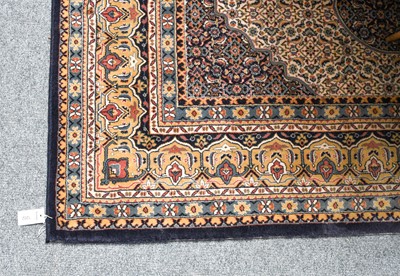 Lot 1202 - A machine made carpet, the Herati field...