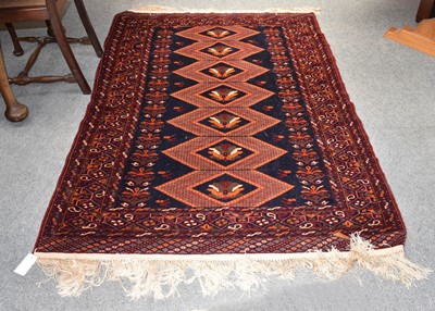 Lot 1194 - Afghan Rug, the midnight blue field with a...