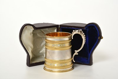 Lot 2105 - A Victorian Parcel-Gilt Silver Mug