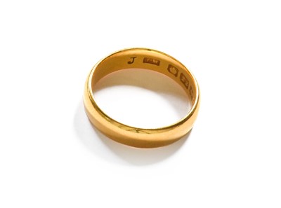 Lot 400 - A 22 Carat Gold Band Ring, finger size J