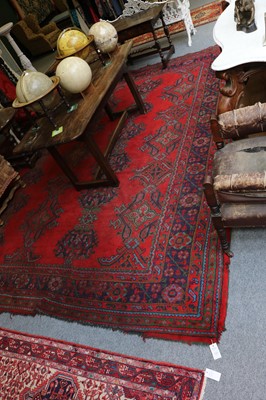 Lot 1127 - Ushak Carpet of Unusual Size, the tomato red...