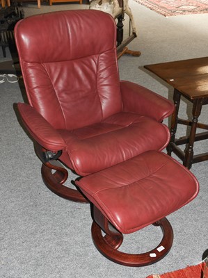 Lot 1235 - An Ekornes Stressless burgundy leather...