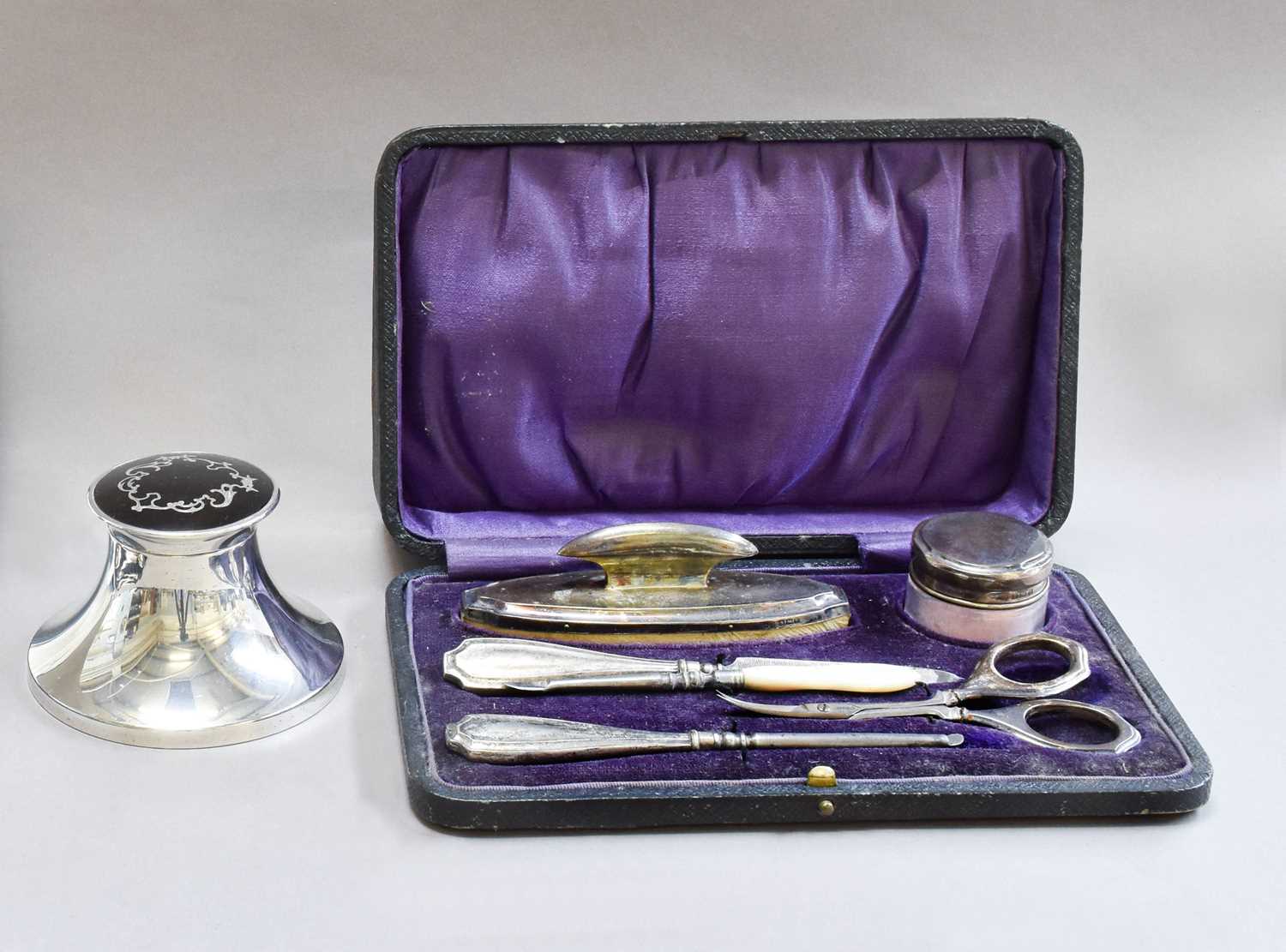 Lot 13 - A cased silver and tortoiseshell dressing...