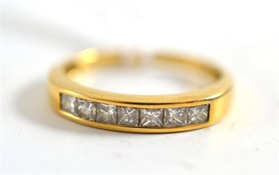 Lot 24 - An 18ct gold diamond half hoop ring, 0.50 carat approximately