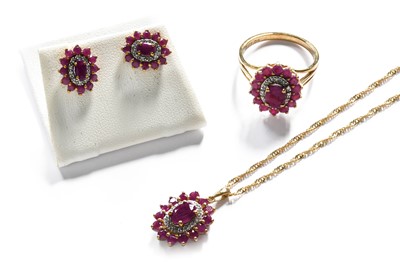 Lot 105 - A 9 Carat Gold Ruby and Diamond Cluster...