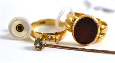 Lot 31 - An 18ct gold Cornelian intaglio ring; a diamond set ring stamped ";18ct";; a paste set tie pin...