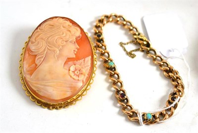 Lot 38 - A 9ct gold cameo brooch and a yellow metal opal set bracelet