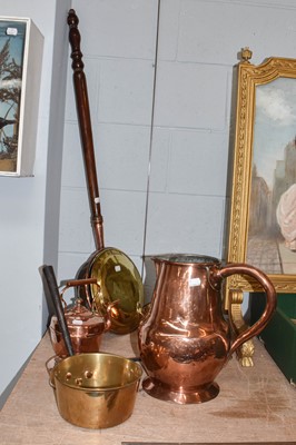 Lot 318 - A 19th century copper jug, with riveted handle...