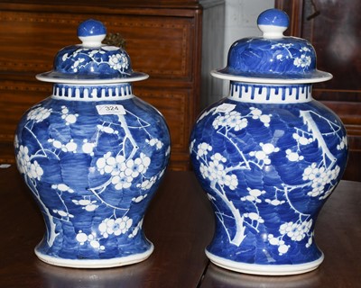 Lot 324 - A pair of Chinese baluster form blue and white...