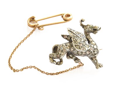 Lot 157 - A diamond dragon brooch, length 3.0cm