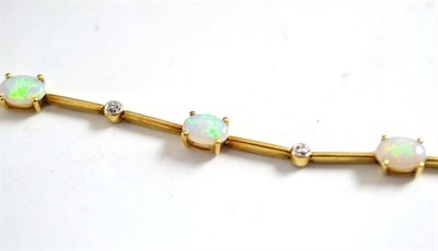 Lot 43 - A 9ct gold opal and diamond bracelet