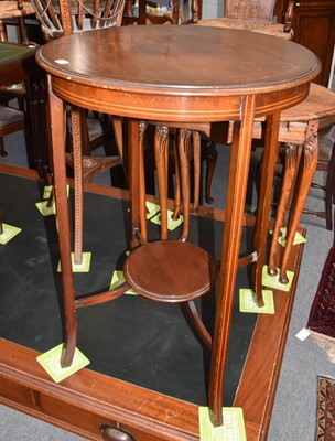 Lot 1124 - A nest of three mahogany tables with carved...