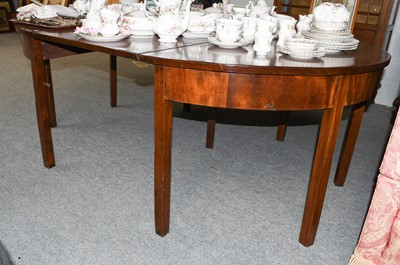 Lot 1082 - A George III mahogany D end dining table with...