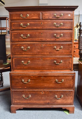 Lot 1130 - A George III oak chest on chest, crossbanded...