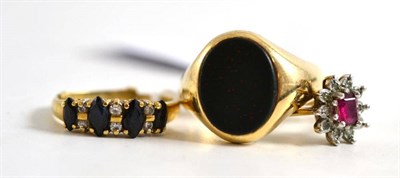 Lot 52 - A bloodstone set 9ct gold ring, 9ct gold ruby set ring and a sapphire set ring stamped '18k'
