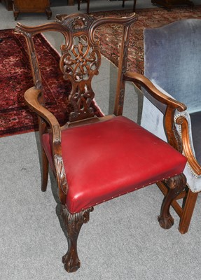 Lot 1087 - A 19th century carved mahogany elbow chair in...