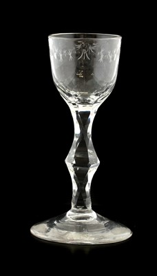 Lot 10 - An Ale Flute, circa 1780, the ogee bowl on a...