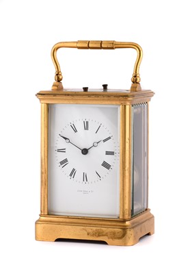 Lot 668 - A Brass Five Minute Repeating Carriage Clock,...
