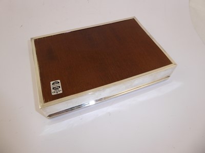 Lot 2056 - A Gold Applied Silver Cigarette-Box