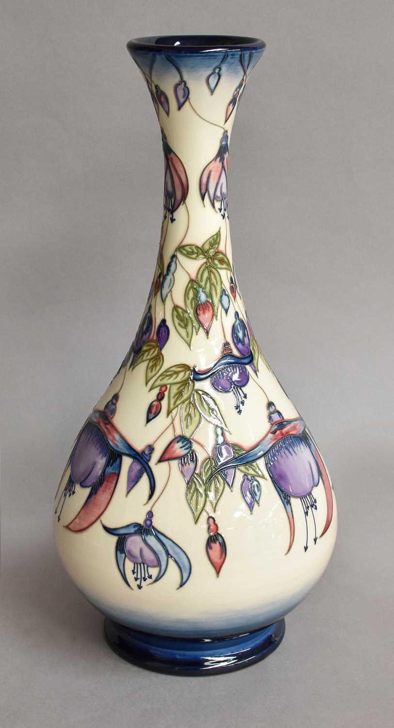 Lot 28 - A modern Moorcroft pottery Fuchsia pattern...