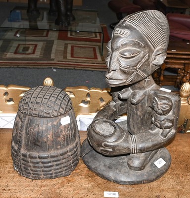 Lot 1297 - A Yoruba figure and Benin mask helmet (2)