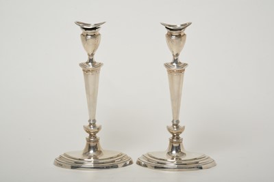 Lot 2100 - A Pair of George V Silver Candlesticks