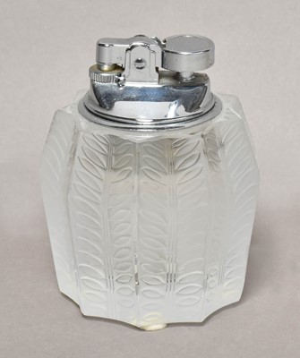 Lot 67 - A Lalique Jamaique frosted glass table lighter,...