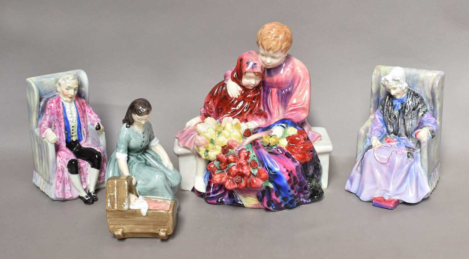 Lot 39 - Four Royal Doulton figures, 'Flower Sellers...
