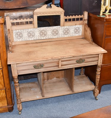 Lot 1311 - A Victorian pine tile back washstand, 107cm by...