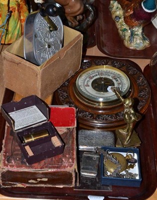 Lot 84 - An aneroid barometer, silver cigarette case and a St Johns ambulance medal with attached silver...